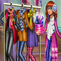 Tris Winter Fashion Dolly Dress Up Game